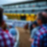 A close-up view of a horse racing track with spectators